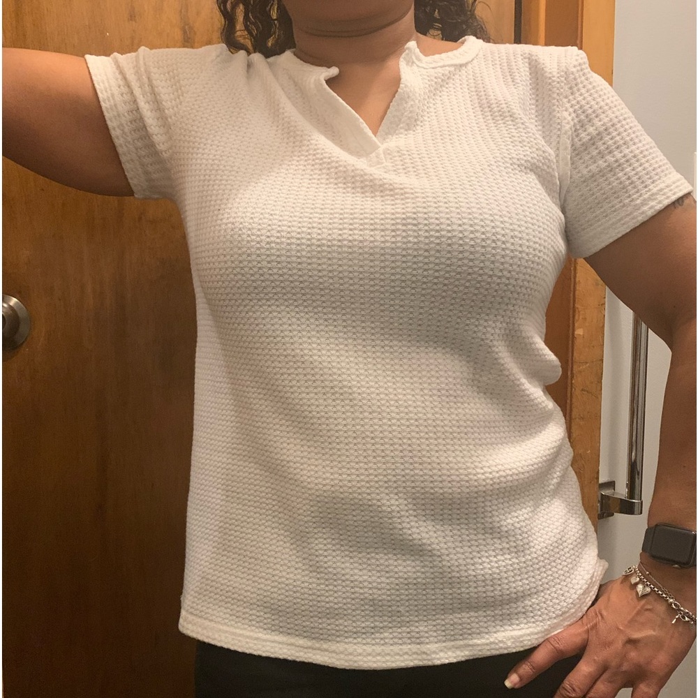 White waffle knit short sleeve low-cut split neck top. Size L.